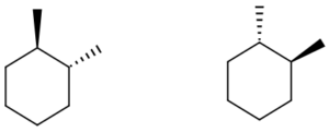 To the right is a six carbon ring structure with a methyl group connected to carbon 1 by a diagonal line and a methyl group connected to carbon 2 by a solid filled triangle. To the left is a six carbon ring structure with a methyl group connected to carbon 1 by a solid filled triangle and a methyl group connected to carbon 2 by a diagonal line.