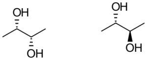 In the image, are two line structures with four carbons. The structure to the right, has a solid filled triangle off carbon 2 connected to the letter "OH" and off carbon 3 is a diagonal line connected to the letter "OH". The structure to the left, has a diagonal line off carbon 2 connected to the letter "OH" and off carbon 3 is a diagonal line connected to the letter "OH".